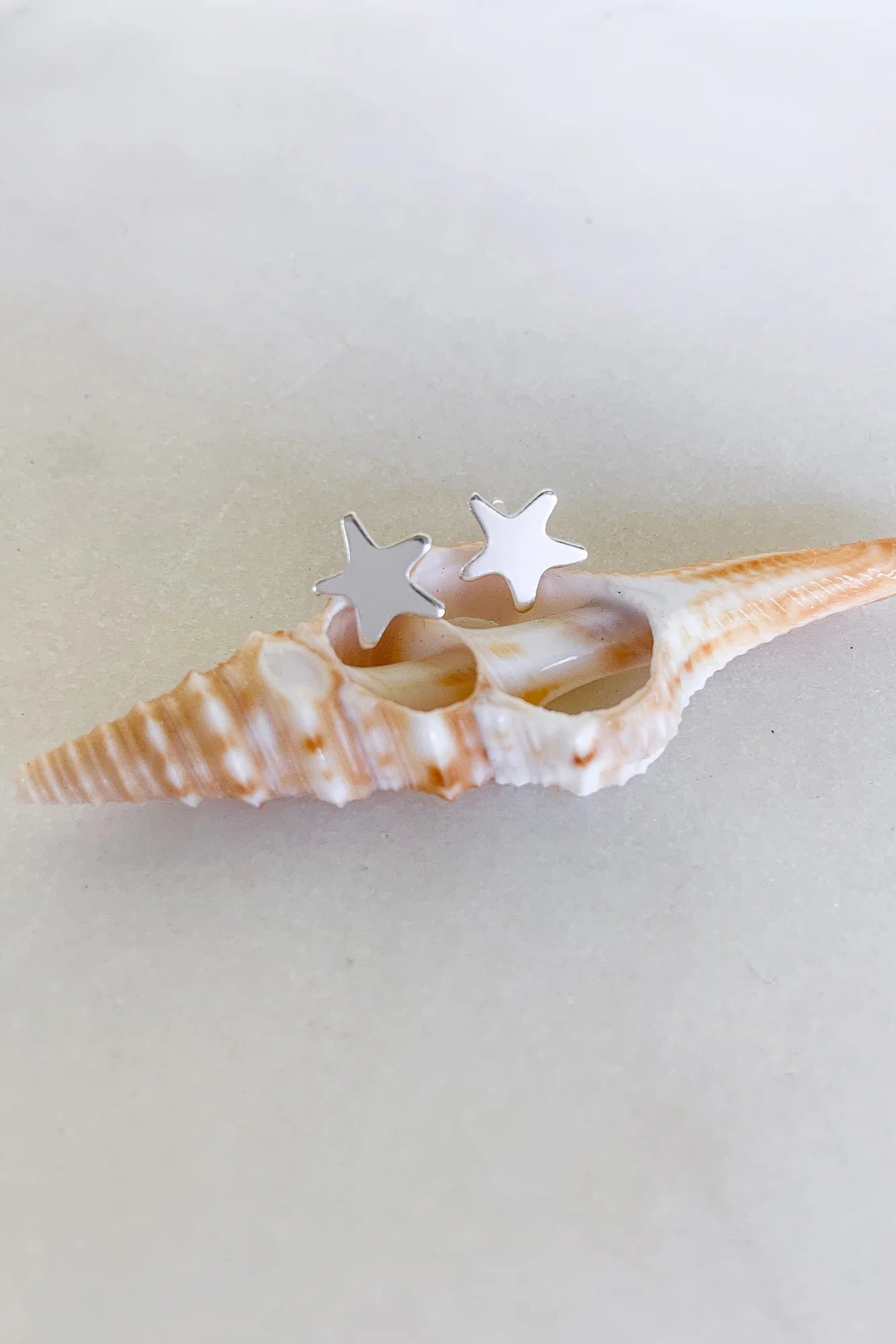 Tiny Star Stud - sterling silver